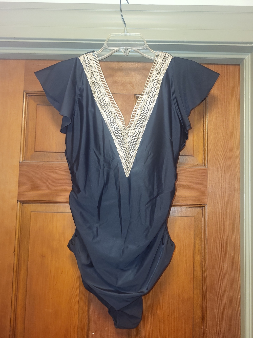 Classic Black One-Piece Swimsuit with Ivory Crochet V-Neck